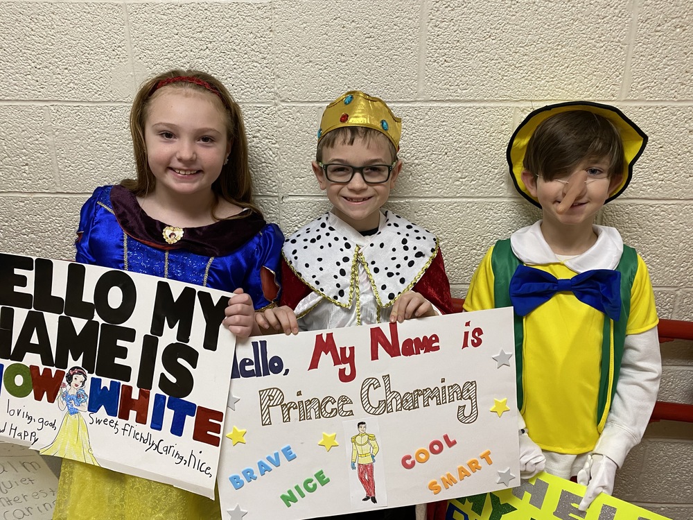 Students dressed as Snow White, Prince Charming and Pinocchio
