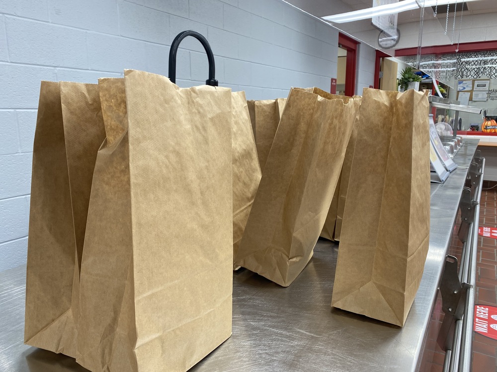 Brown bags with breakfast
