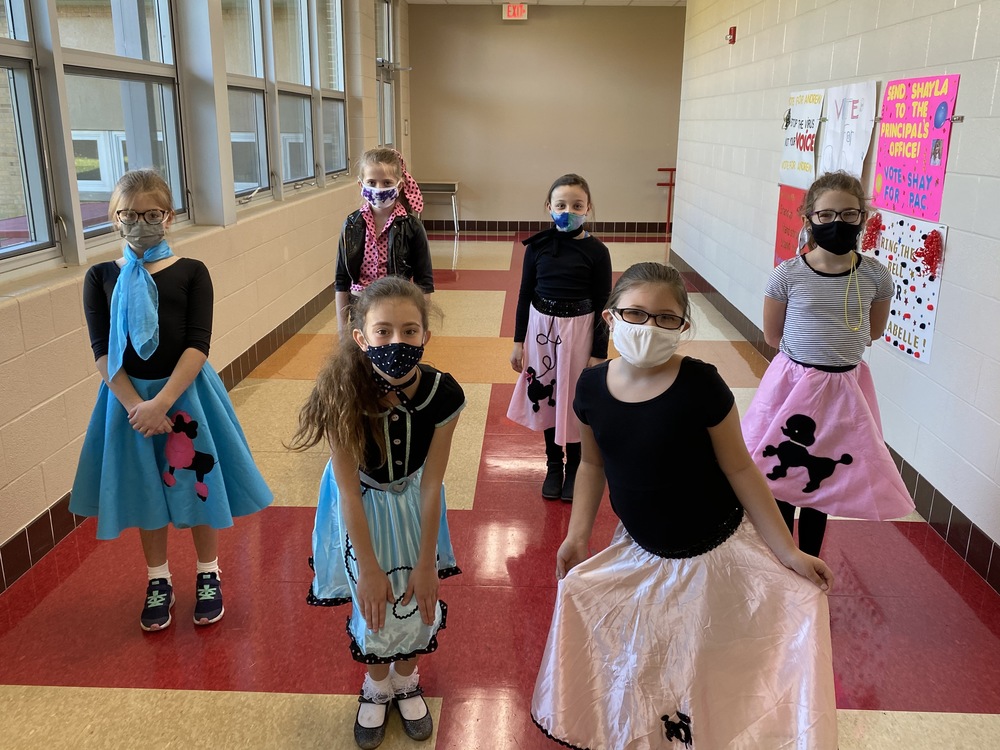 Students dressed in poodle skirts for the 50 th day of school.